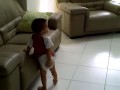 Shayne Lying On Sofa Watching Barney