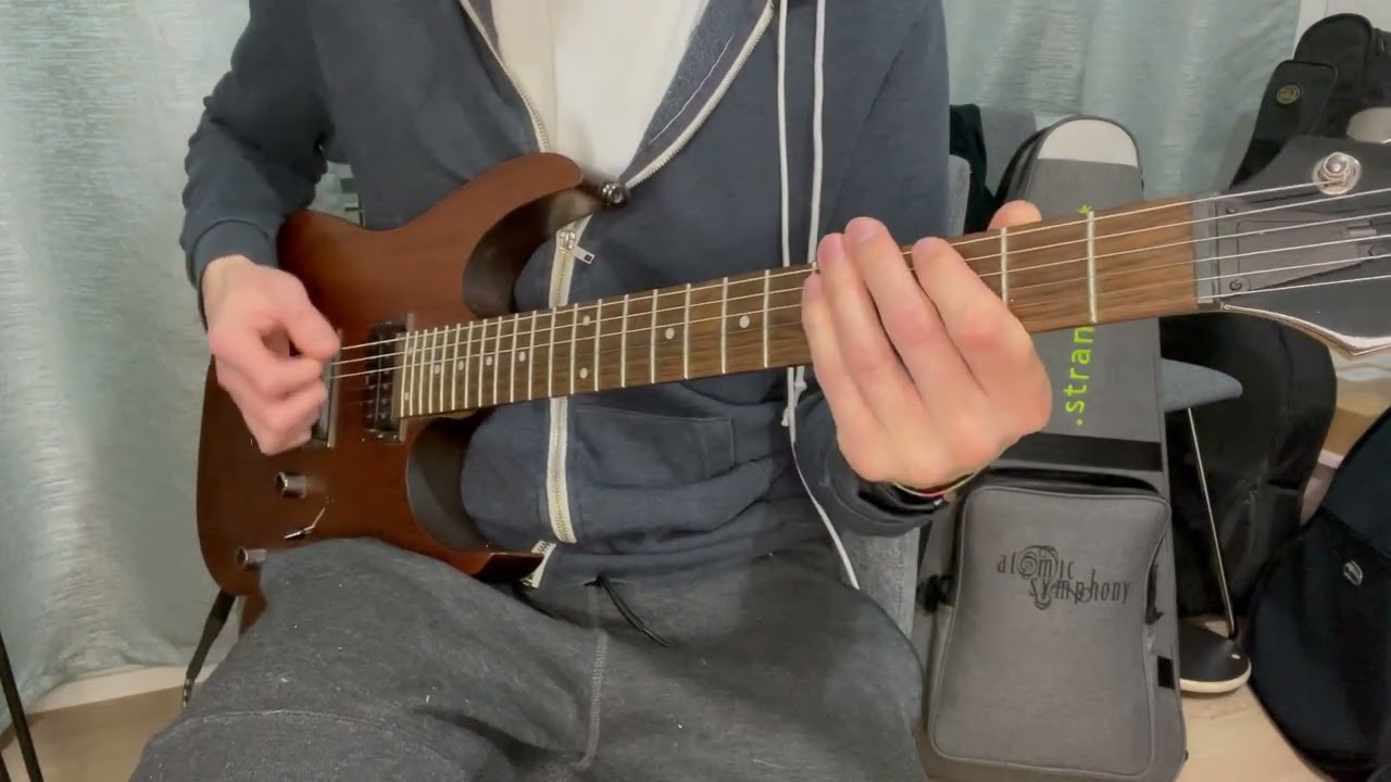 Guitarist playing the Welcome To Bucketheadland intro riff by Buckethead