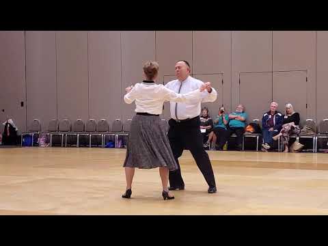 Tony & Carolyn Ahart performing a demonstration dance at the 70th National Square Dance Convention in Jackson, MS.