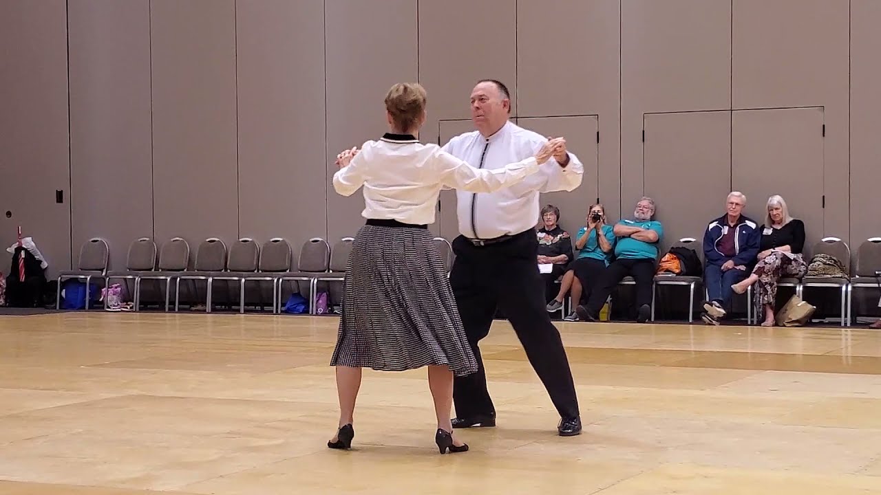 Tony & Carolyn Ahart performing a demonstration dance at the 70th National Square Dance Convention in Jackson, MS.