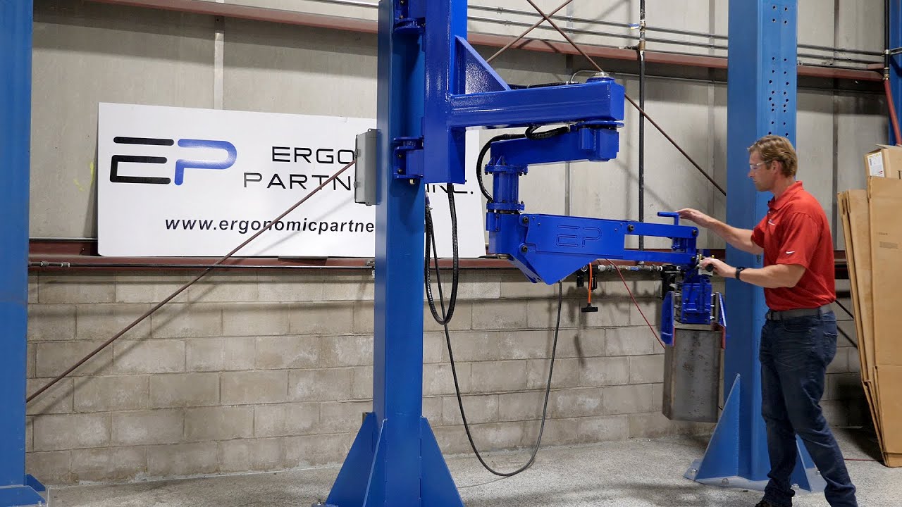 Machine Mounted Manipulator Arm for Loading a Press