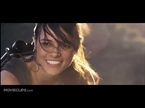 Fast & Furious (2009) official trailer frame with Dom and Brian in a street-race lineup