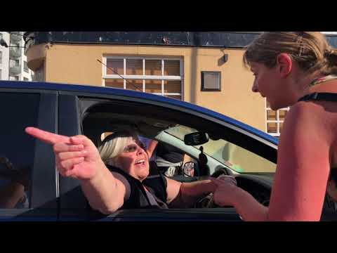 Woman Tries To Drive Her Car Through Marathon