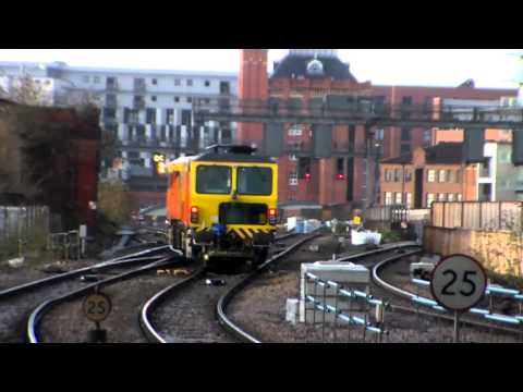 Colas Rail Tamper, DR73942, 6J73 Passing Manchester Victoria (3rd January 2014)