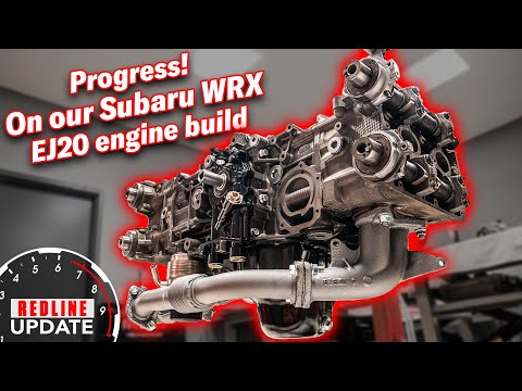 Heads, oil pump and exhaust manifold make their way onto our Subaru WRX EJ20 engine rebuild