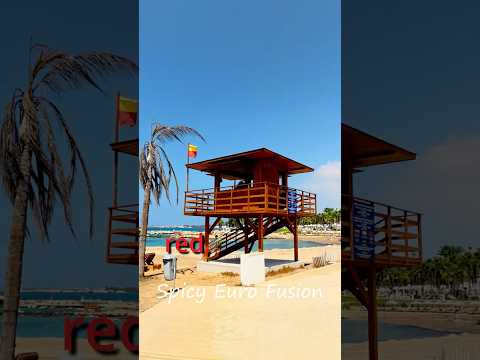 Beach Flags in Paphos Explained – You’ll Be Surprised! 🚩