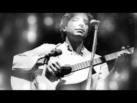 Trailer frame of the film’s closing segment with Leonard Cohen and U2 performing