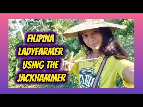 LADYFARMER(FILIPINA) USING THE JACK HAMMER LOL
