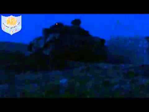 تجهيز الدبابات للمشاركة في معركة فك الأسرى من قبل جيش المهاجرين والأنصار في مخيم حندرات في محافظة حلب