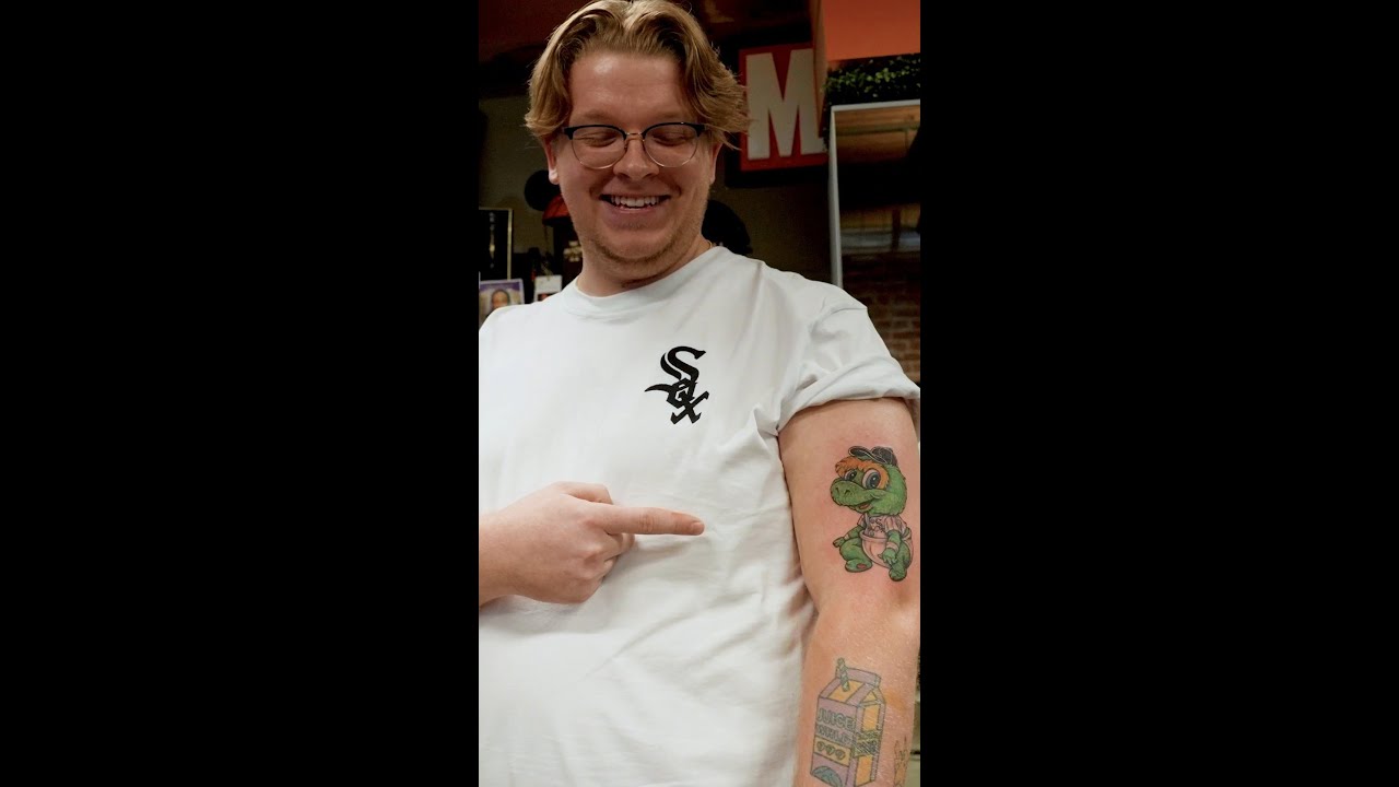 the ultimate fan with the ink to prove it