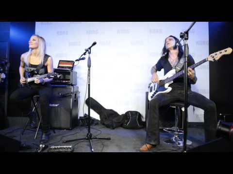 Nita Strauss and Chuck Garric play Iron Maiden at Korg booth sound room