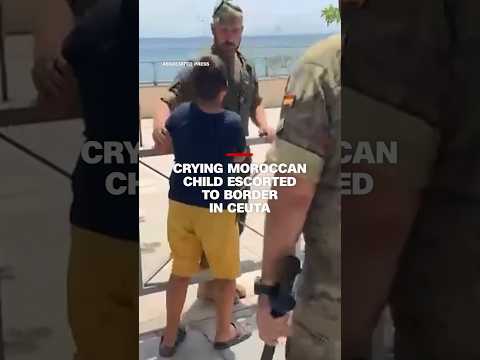 Crying Moroccan child escorted to border in Ceuta