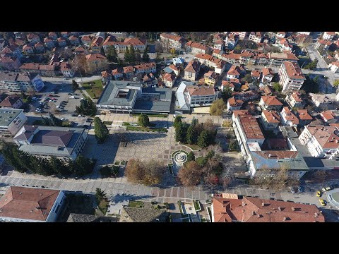 Troyan  - the beautiful historic town in the mountains, seen from a drone