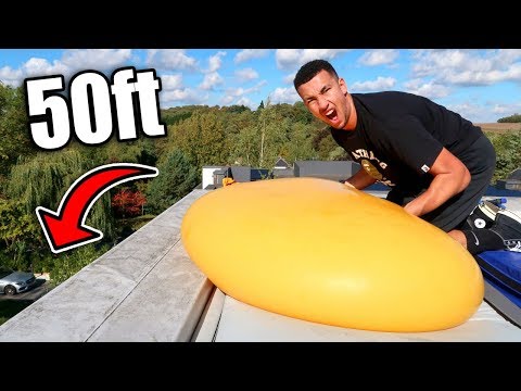 DROPPING GIANT 6ft WATER BALLOON OFF THE HOUSE!!