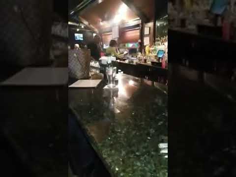 Erika Kayne.bartending and singing I Need You Bad by Jasmine Sullivan