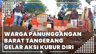 Warga Panunggangan Barat Tangerang Gelar Aksi Kubur Diri, Tolak Relokasi Makam Syekh Buyut Jenggot