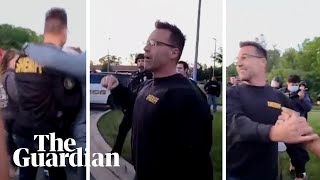 'These cops love you': Michigan sheriff joins George Floyd protesters in Flint