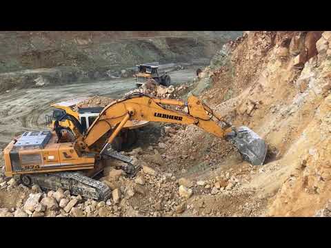 Liebherr 974 Excavator Loading Caterpillar Dumpers - Labrianidis S.A