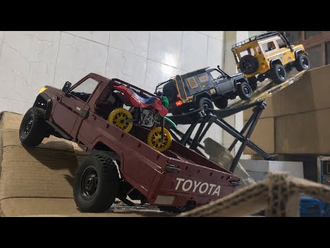 Toyota Pickup RC Truck Climbing Cardboard Ramp | Off-Road RC Adventure with Land Rover Defender