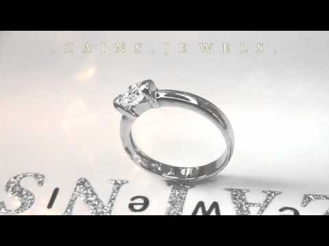 UNIQUE TENSION SET ENGAGEMENT RING. NEW