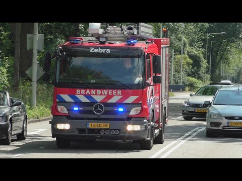Brandweer Tankautospuit Zebra 13-2231 met spoed naar een brandmelding in Amsterdam-Noord