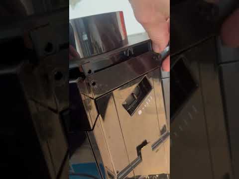 How to open the  Melitta CaffeO Passione espresso machine