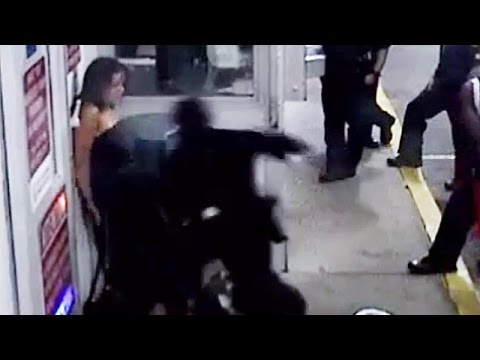 woman officer handcuffed