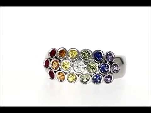 Platinum, rainbow range multi-coloured sapphire, ruby & diamond dress ring