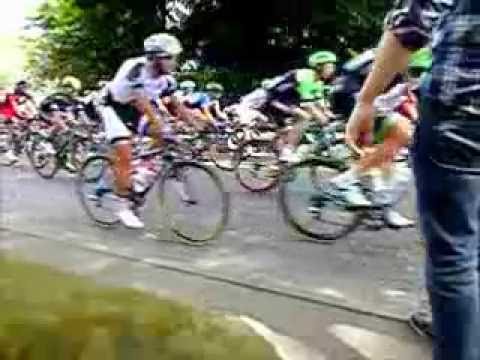The Tour de Yorkshire main group passing through Thongsbridge, West Yorkshire - high speed recording