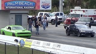 Tesla Model S P85D Sets 1/4 Mile World Record While Challenger Hellcat Goes up in Smoke Drag Racing