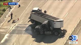 SkyEye video shows 18-wheeler crash along I-10 westbound at Fry Road blocking multiple lanes