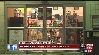 CVS robber in standoff with police