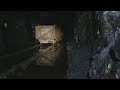 Climbing down to the mine carts in an abandoned mine