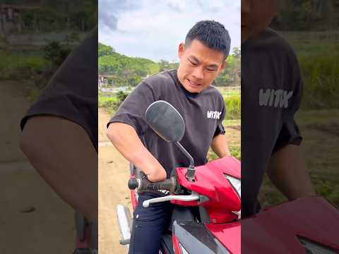How to ride a motorbike with one arm.