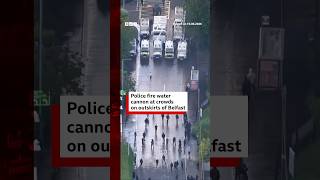 Police fire water cannon at crowds on outskirts of Belfast. #BBCNews