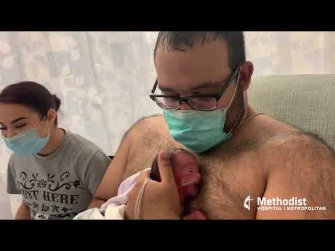 Dad holds son in NICU for the first time