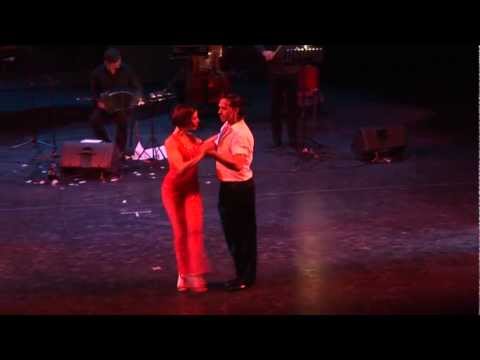  Gisela Natoli  and  Gustavo Rosas  are  dancing  to  the  nontraditional song  "  Oblivion  "  at  Aix Tango Festival  in  2012