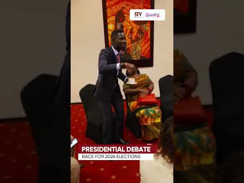 Bobi serves tea to Barbie