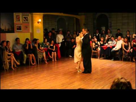  Cristina Sosa  and  Daniel Nacucchio  are  dancing  to  a  tango  at  Otono Tango Festival  in  2014