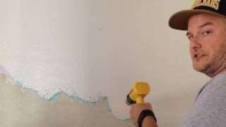 Plaster Wall Restoration: Removing Layers of Paint and Texture