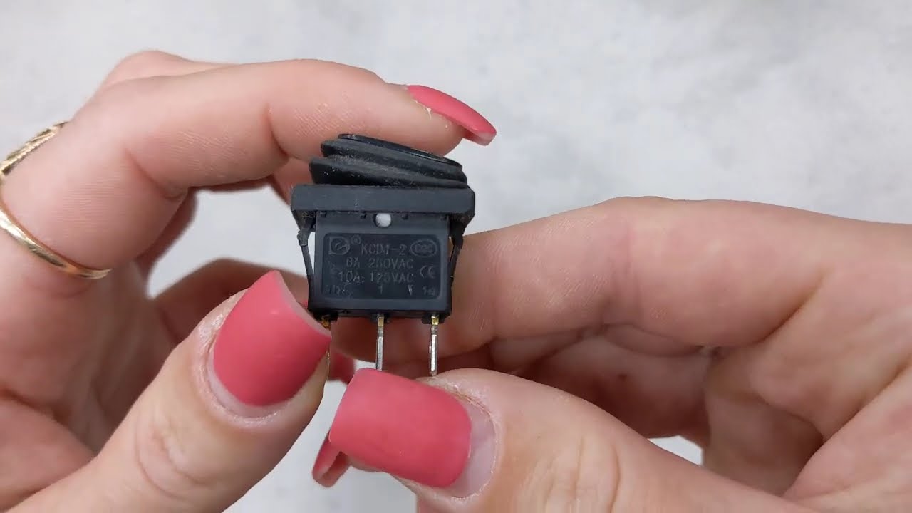 Перемикач АСКО-УКРЕМ KCD1-2-101WN GR/B 1-клавішний із захистом зелений з підсвіткою A0140040059