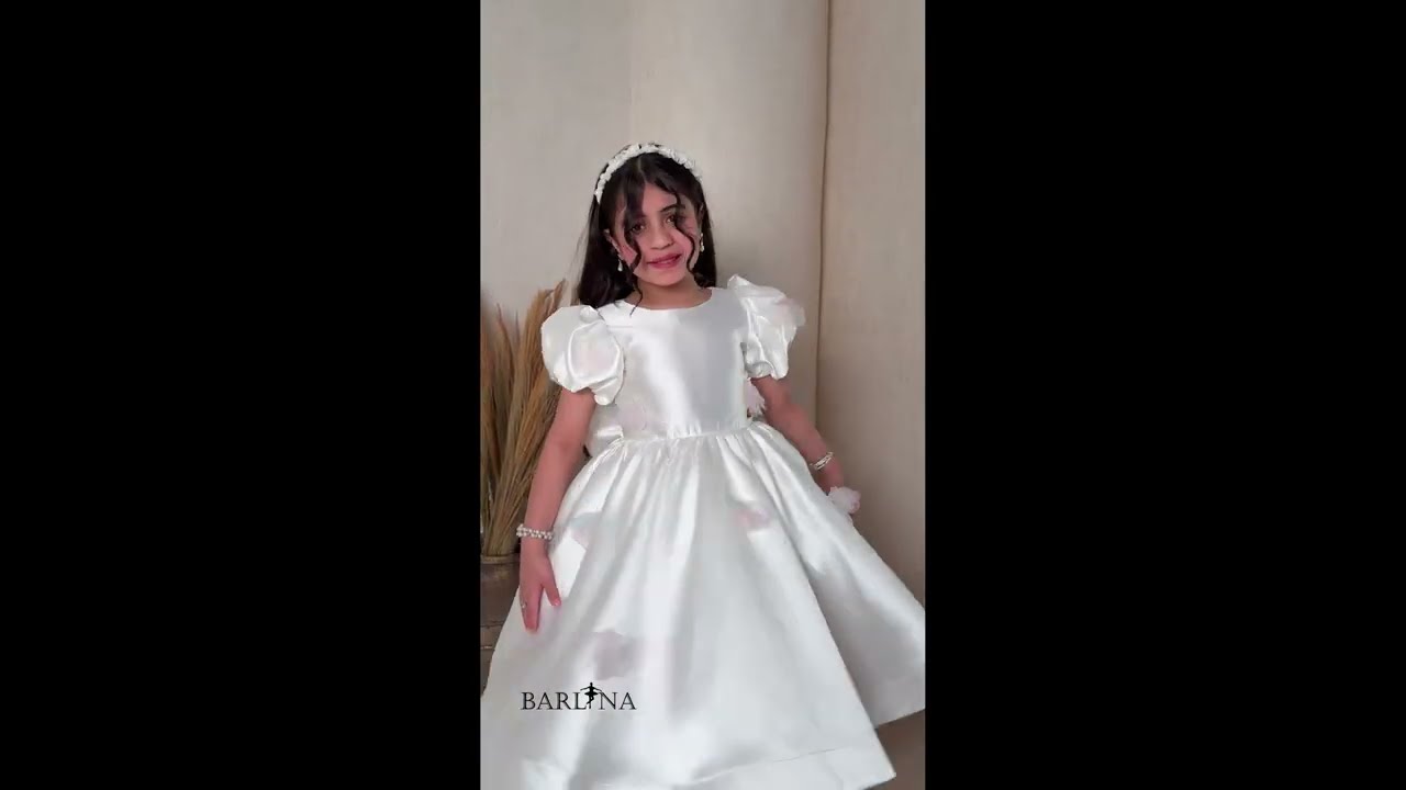 Off-white girls' dress with a royal cut - 2 years