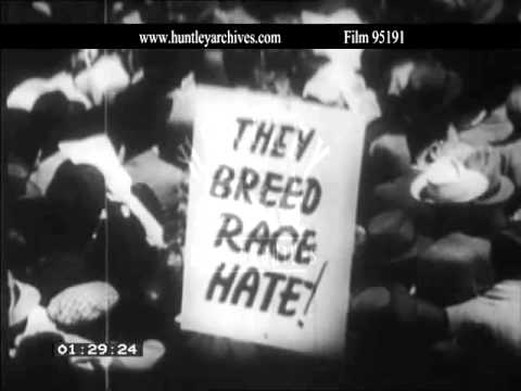 Anti-Apartheid march in 1950's South Africa.  Archive film 95191