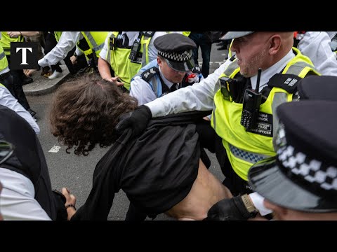 Protesters And Police Clash Outside Thistle City Barbican Hotel