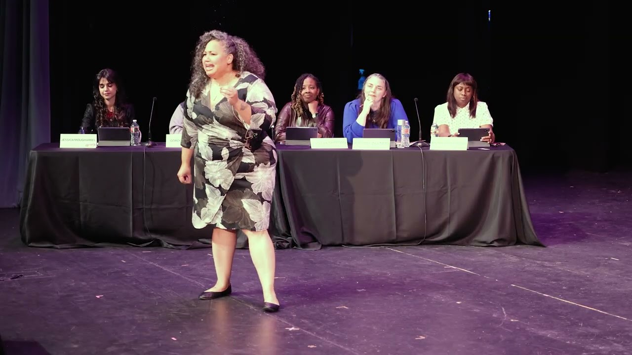Emily Sanders speaking on stage at the SVP Fast Pitch Showcase
