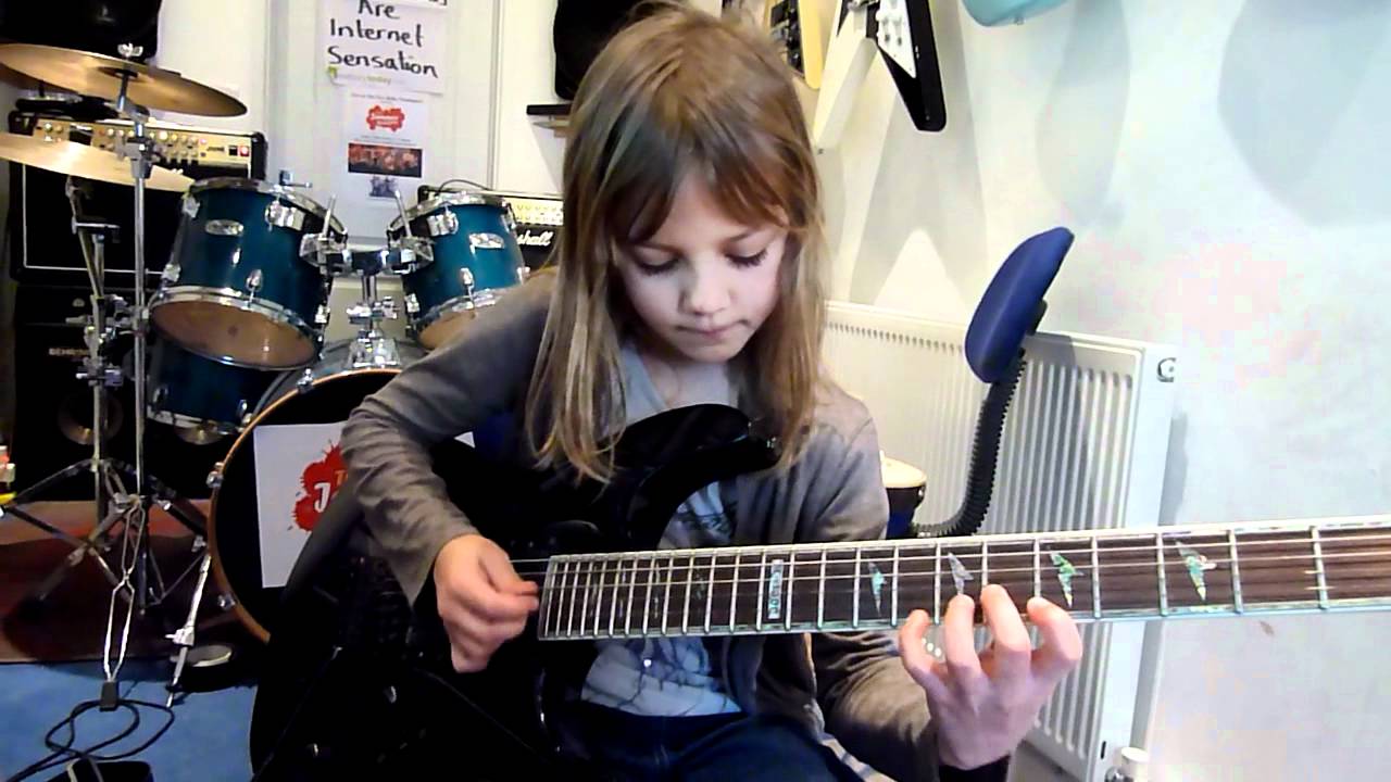 8 year old The Mini Band guitarist Zoe Thomson working on Stratosphere by Stratovarius. - YouTube
