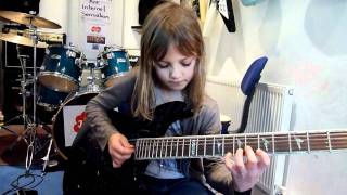 8 year old The Mini Band guitarist Zoe Thomson working on Stratosphere by Stratovarius.