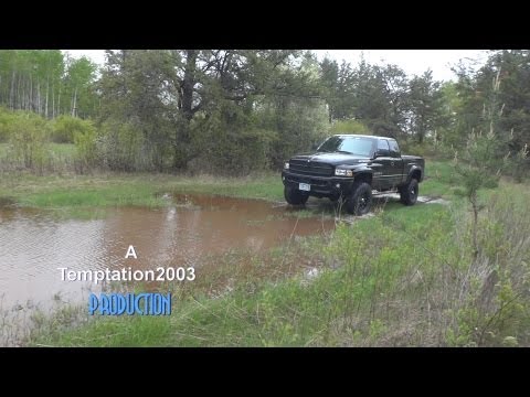 5" Lifted Dodge Ram on 35's throwing some mud!