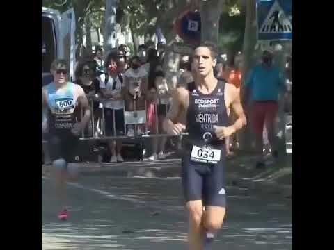 Watch Triathlon Runner Stop Running And Let His Competitor Beat Him