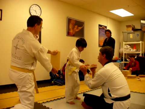 Ojas breaking a board